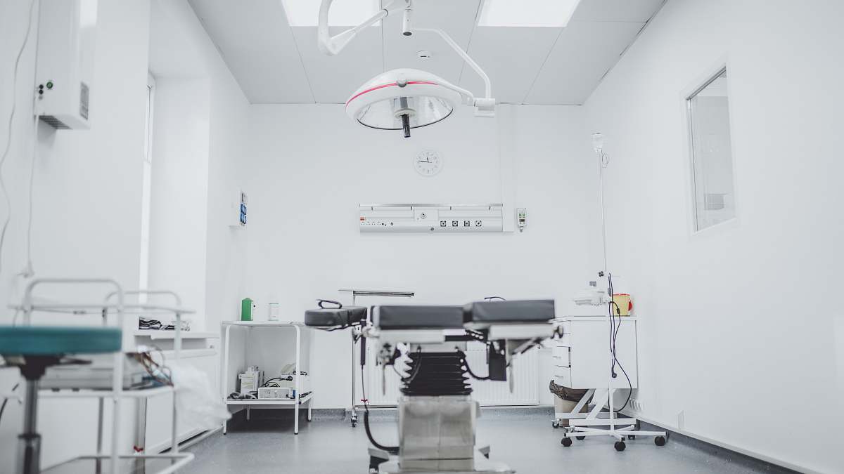 hospital black and white hospital bed in the middle of interior building operating theatre