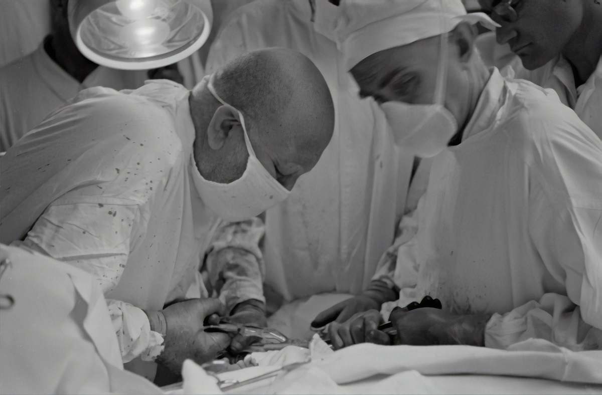 hospital doctors doing operation black-and-white