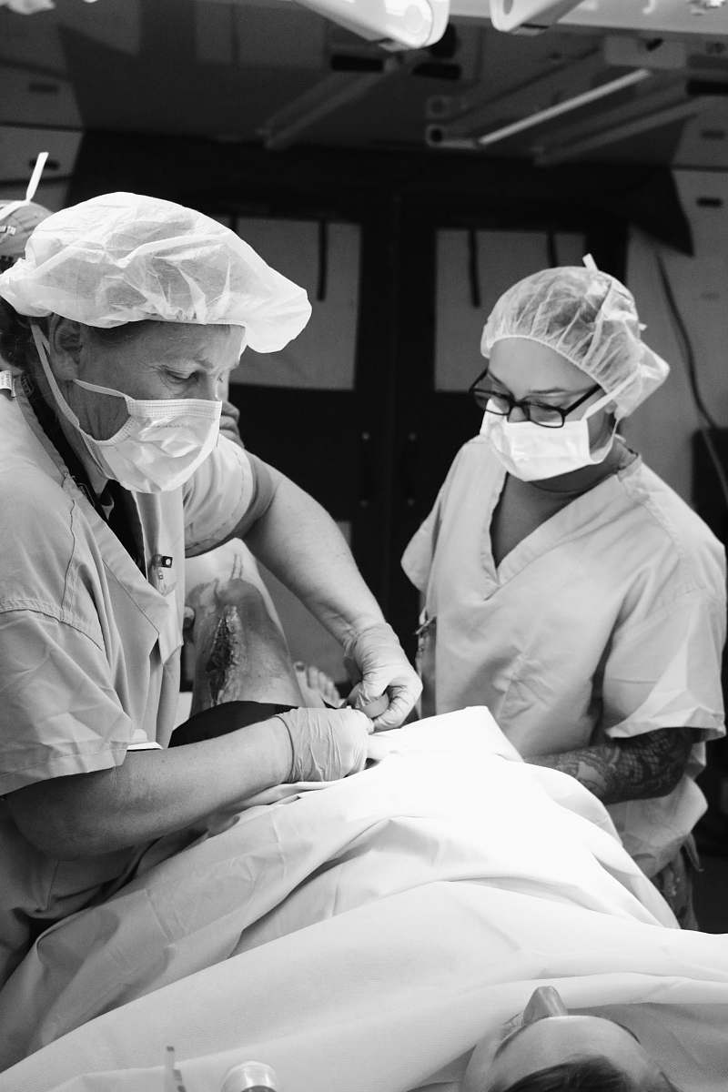 person woman wearing medical mask black-and-white