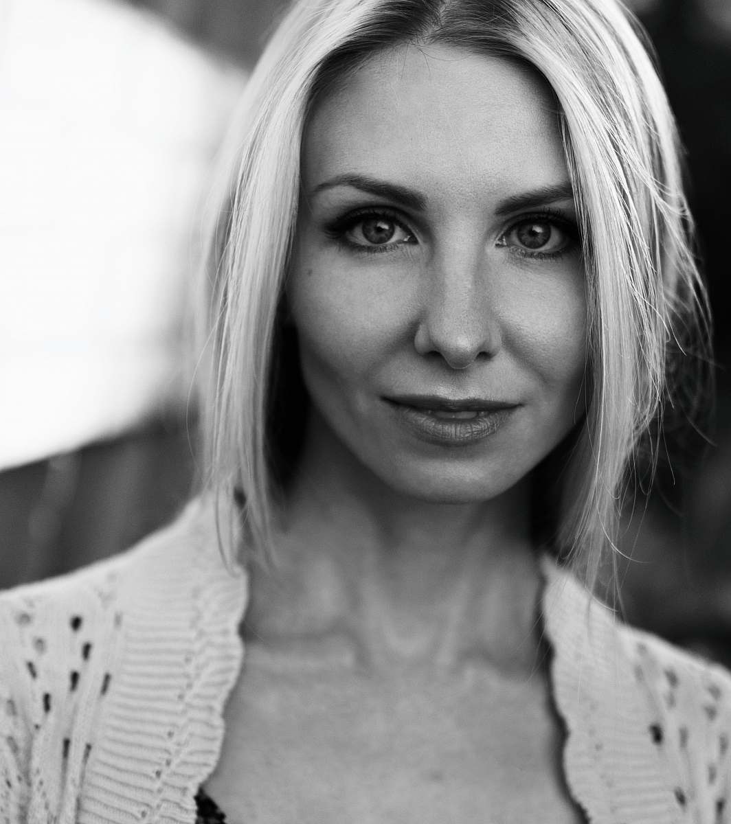 person grayscale photography of woman wearing lace shirt black-and-white