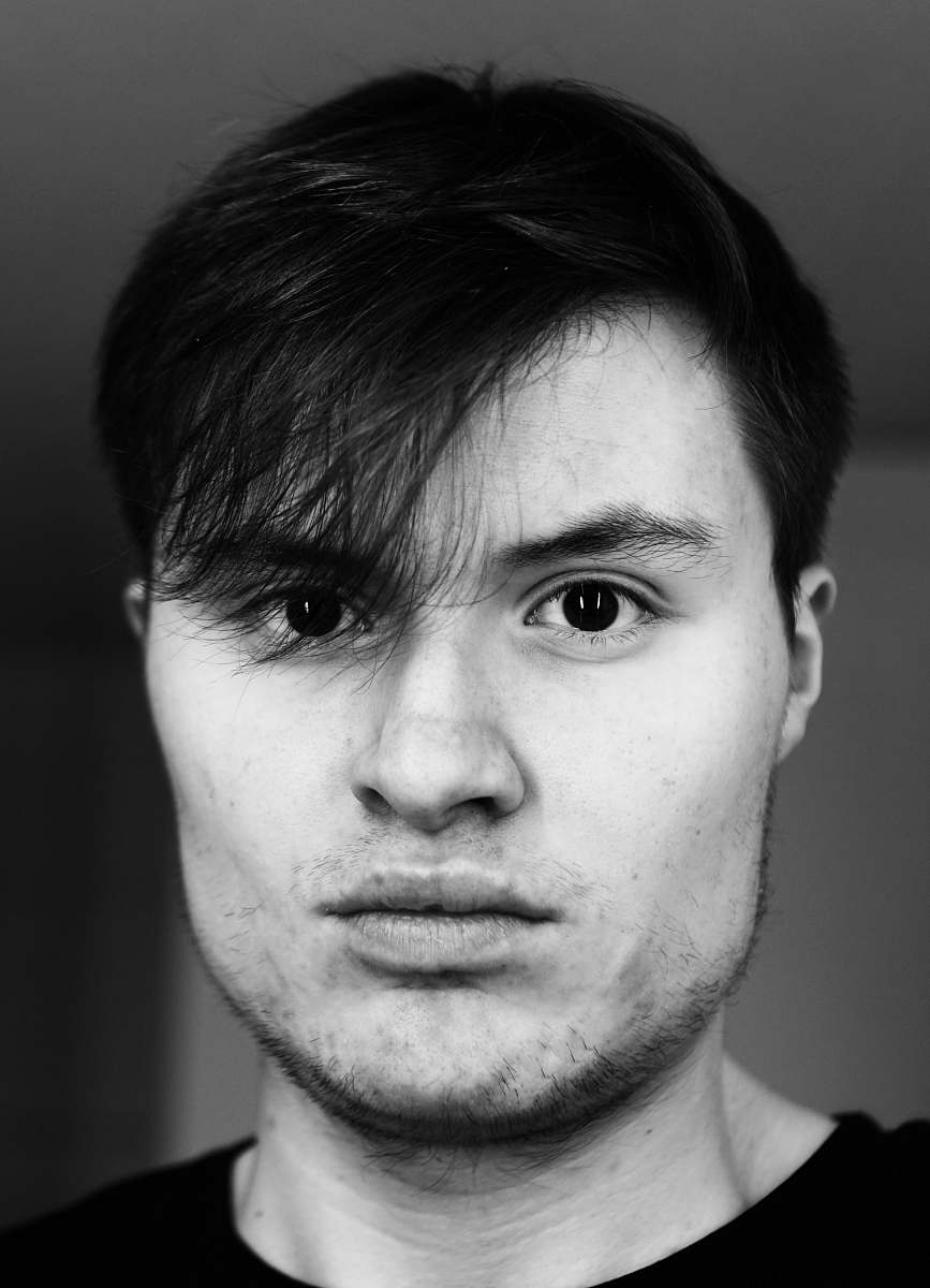 black-and-white man wearing black shirt face