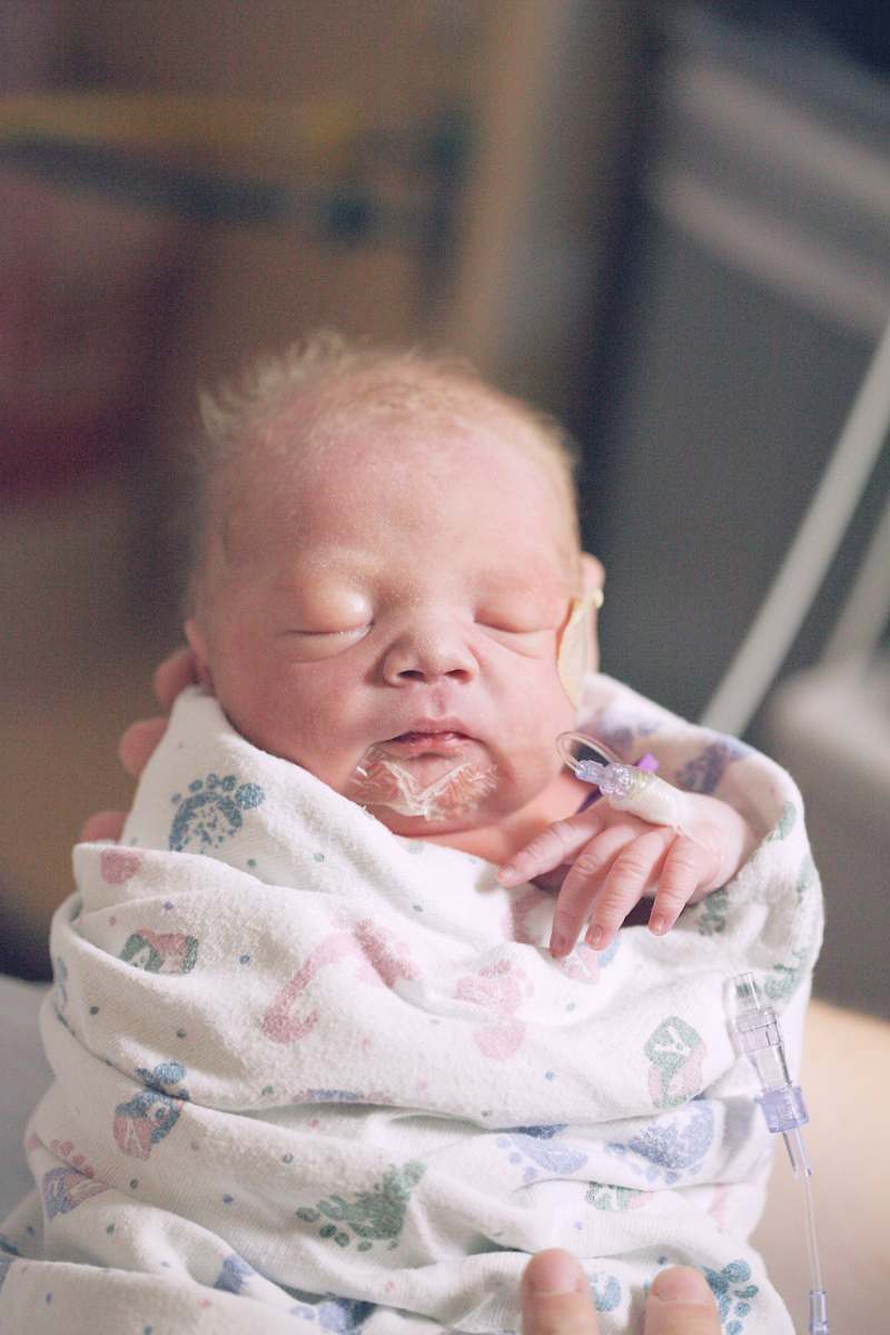 person person holding baby baby