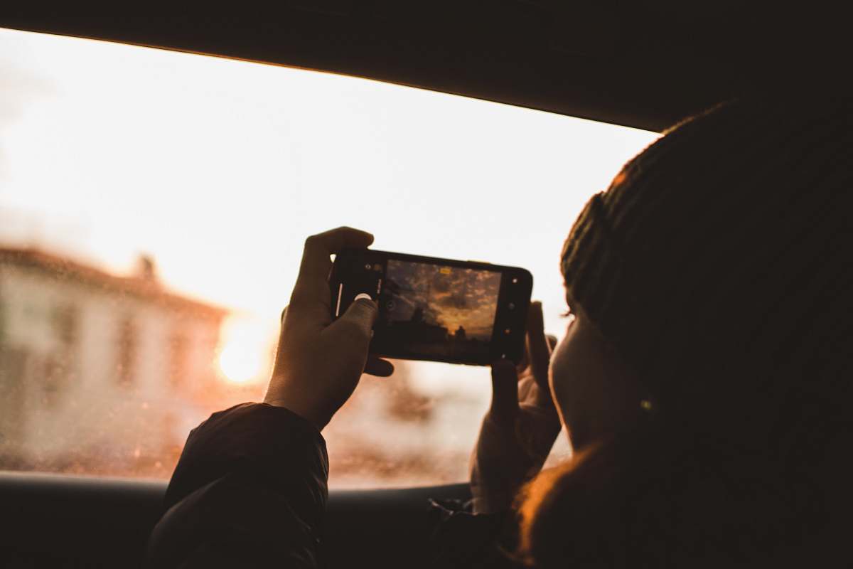 person woman holding Android smartphone photo