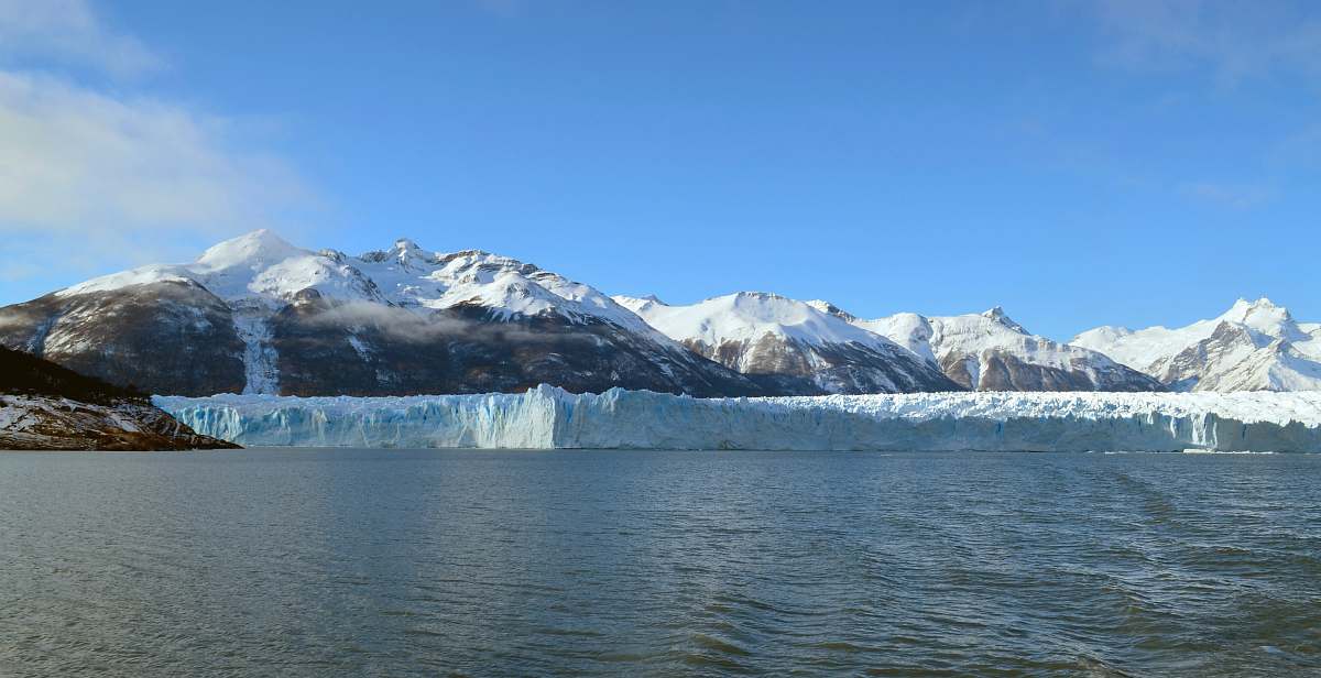 mountain landscape photography of iceberg melting during daytime glacier