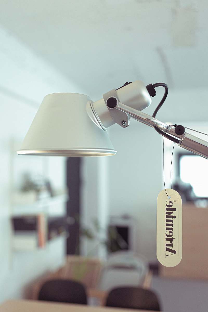 lampshade white desk lamp near chairs grey