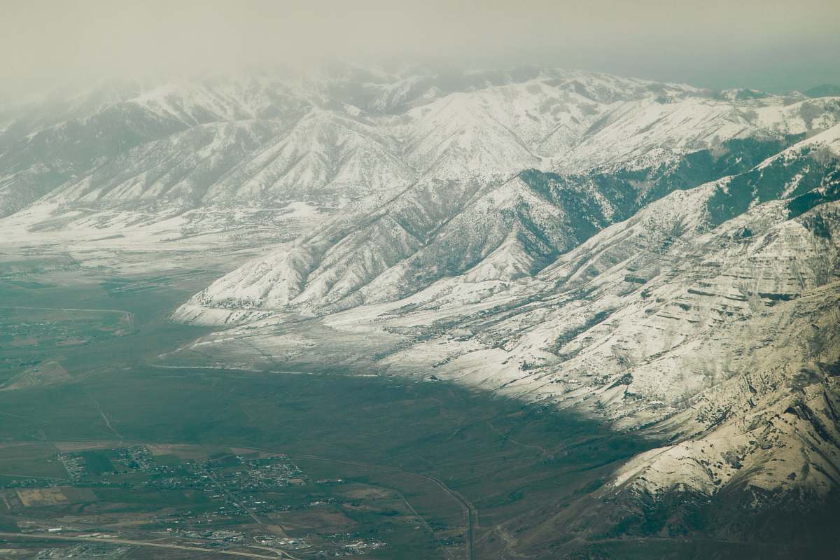 glacier aerial view of mountain range snow