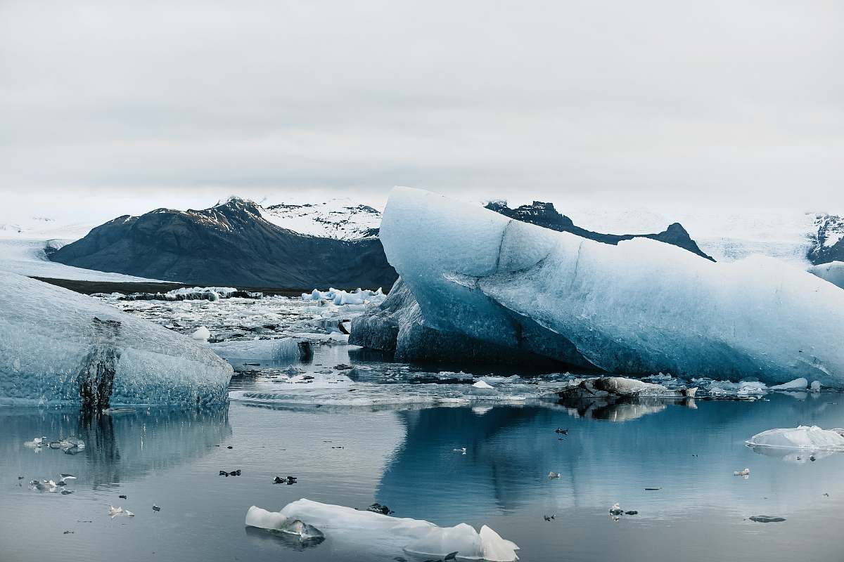 nature large body of water with iceburgh at winter ice