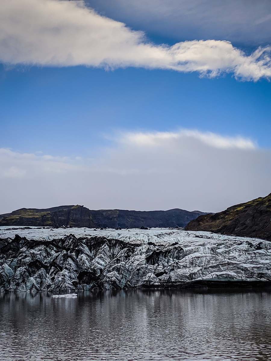 nature mountain near body of water outdoors