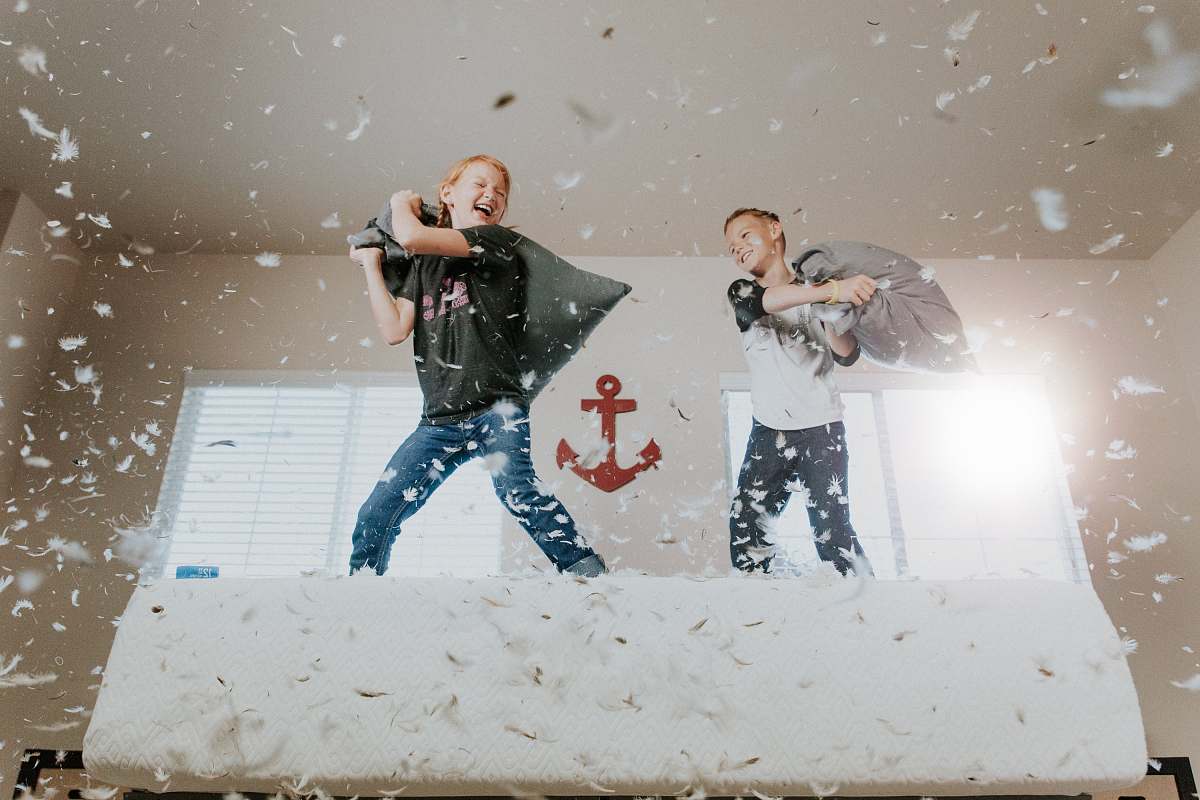 kid two toddler pillow fighting human