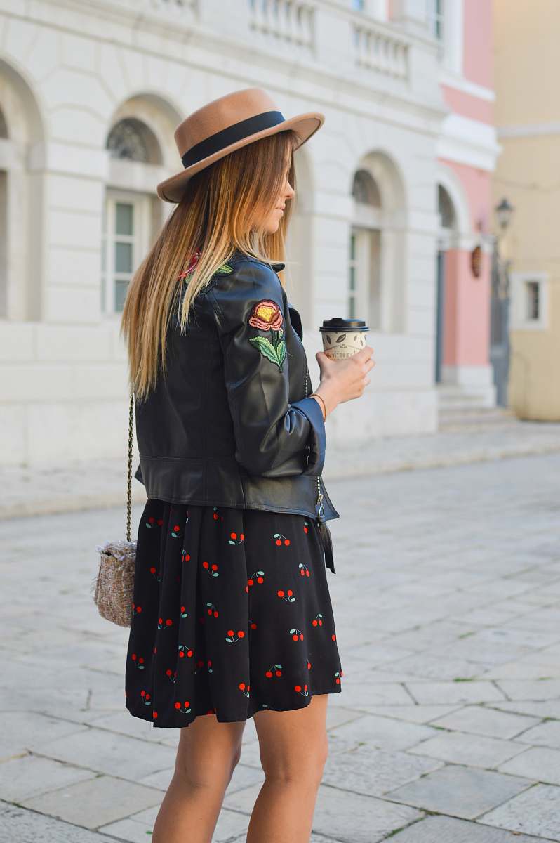 woman woman holding disposable cup girl