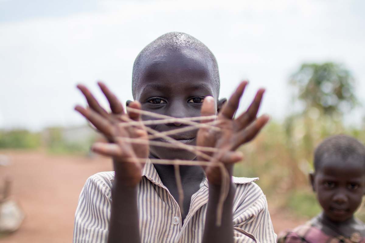 people boy showing hand with rubber human