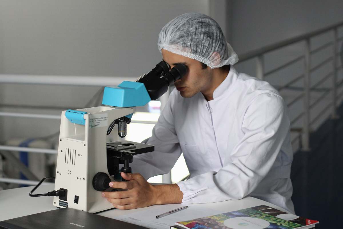 human man sight on white microscope people