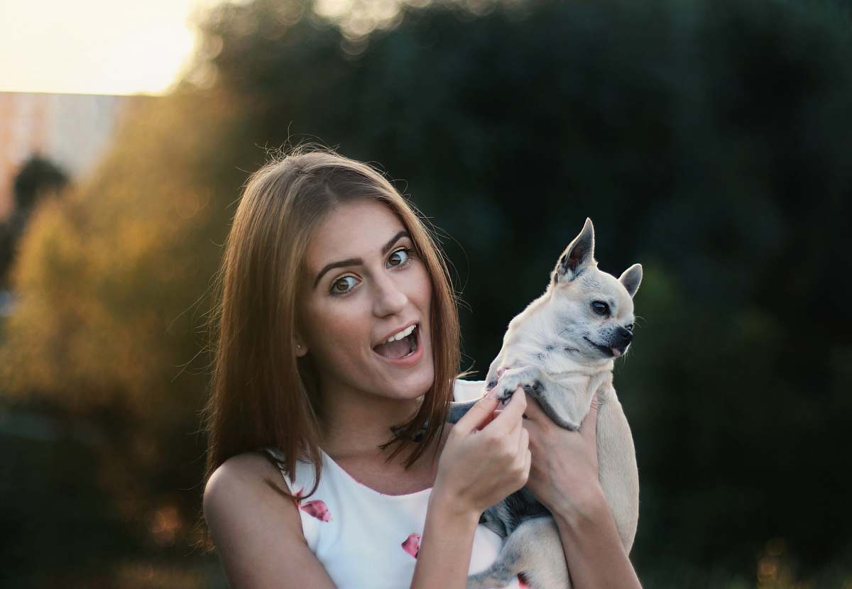 human woman wearing white tank top animal