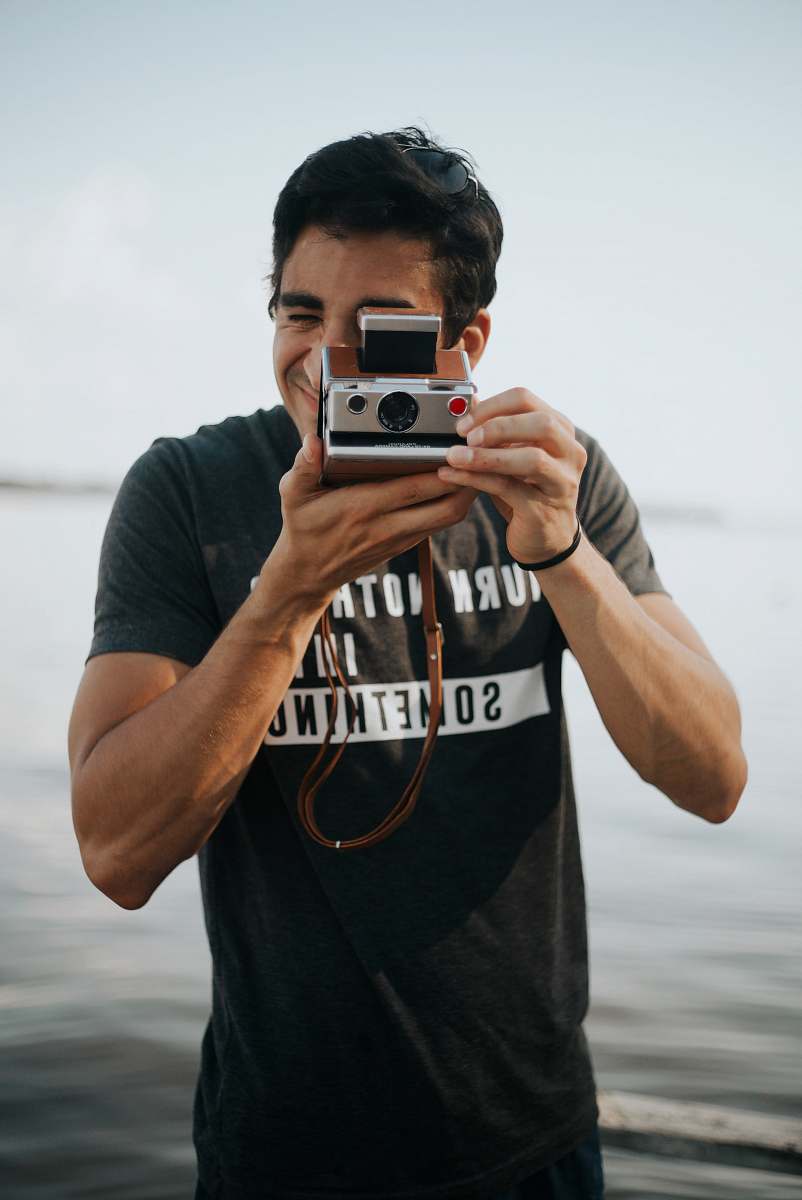 human man taking photo person