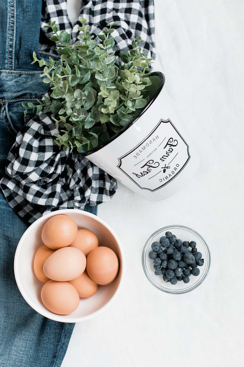 food photo of organic egg bowl in bowl beside berry vegetable