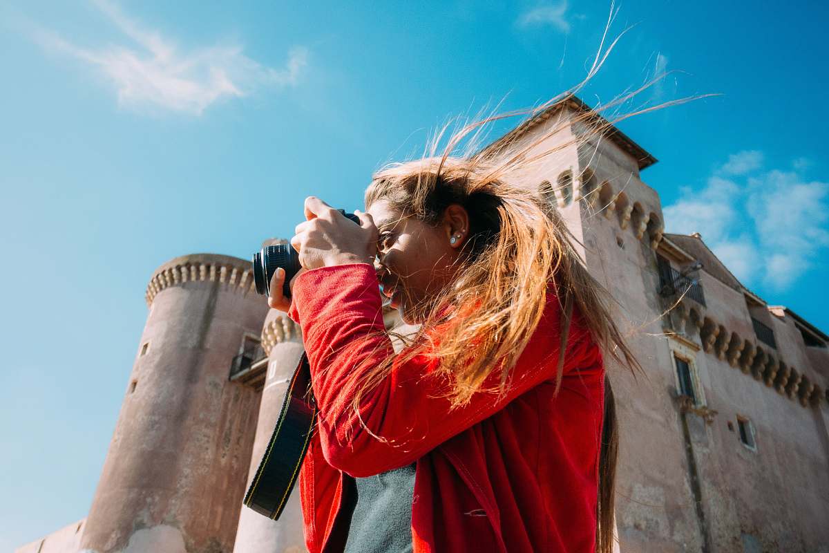 architecture woman with DSLR camera building