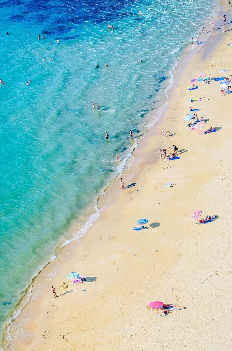 ocean aerial photography of people on beach nature