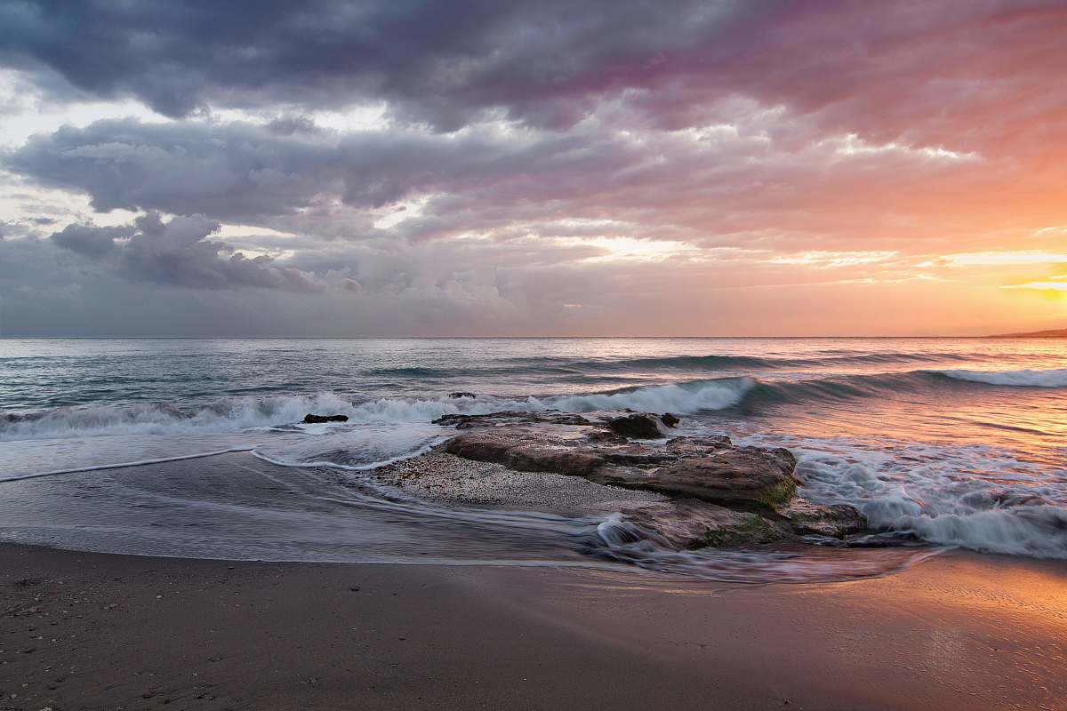 water ocean wave beside seashore during daytime sky