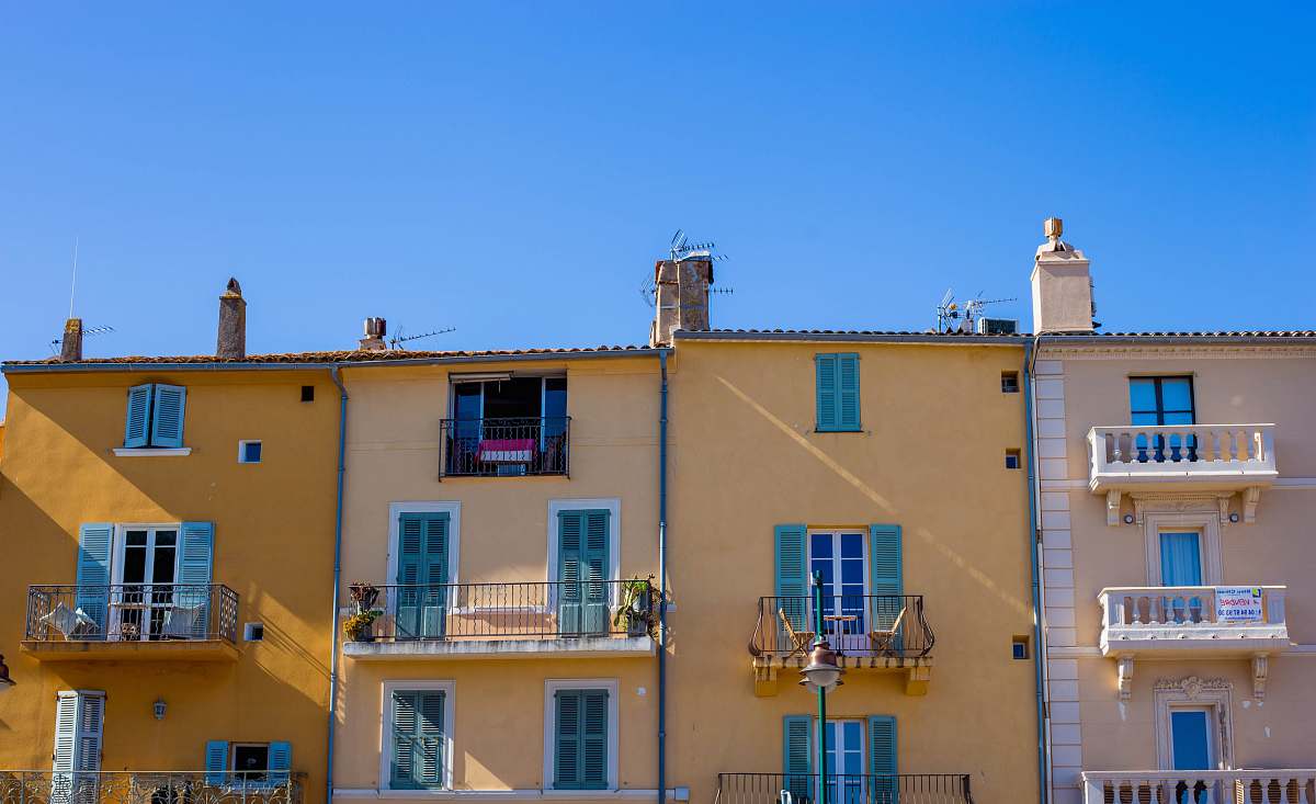 balcony brown and white concrete buildings house