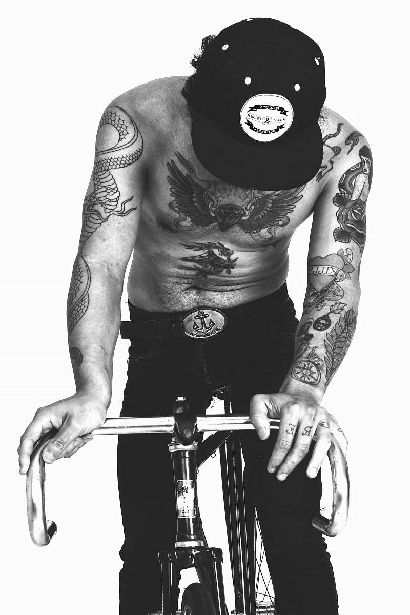 people man rides bicycle tattoo