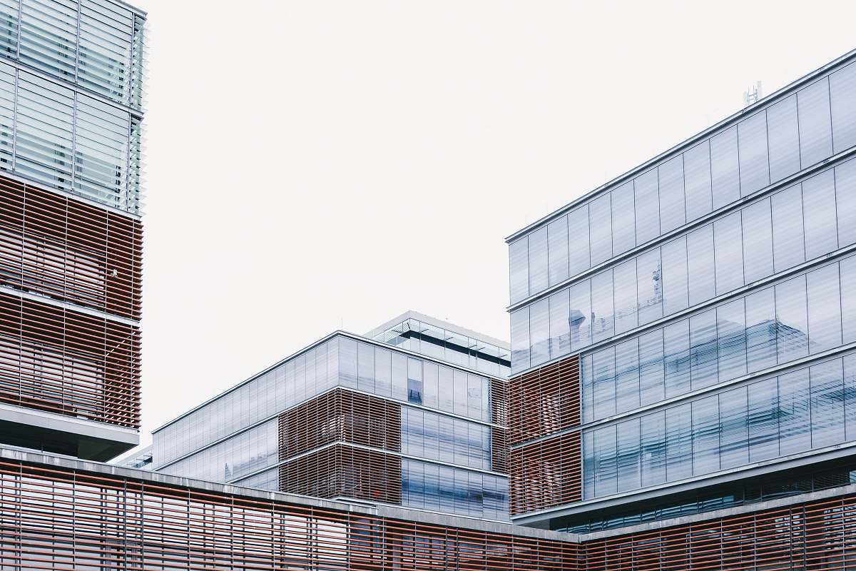 city low angle photography of high-rises building romania