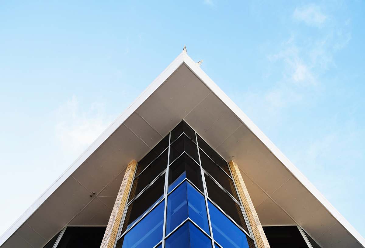 triangle worm's eye view of building under clear blue sky southampton