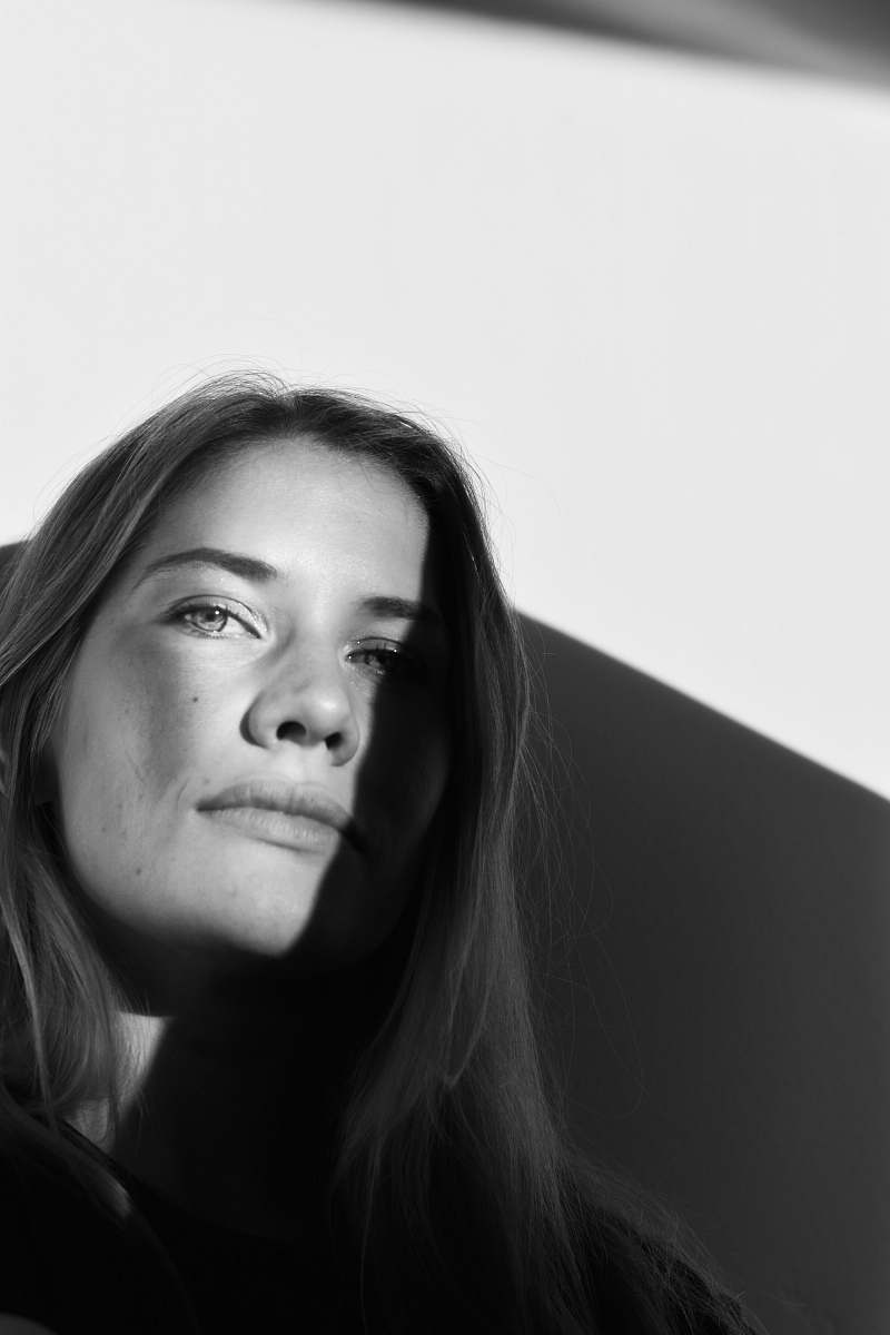 black-and-white gray-scale photo of woman face