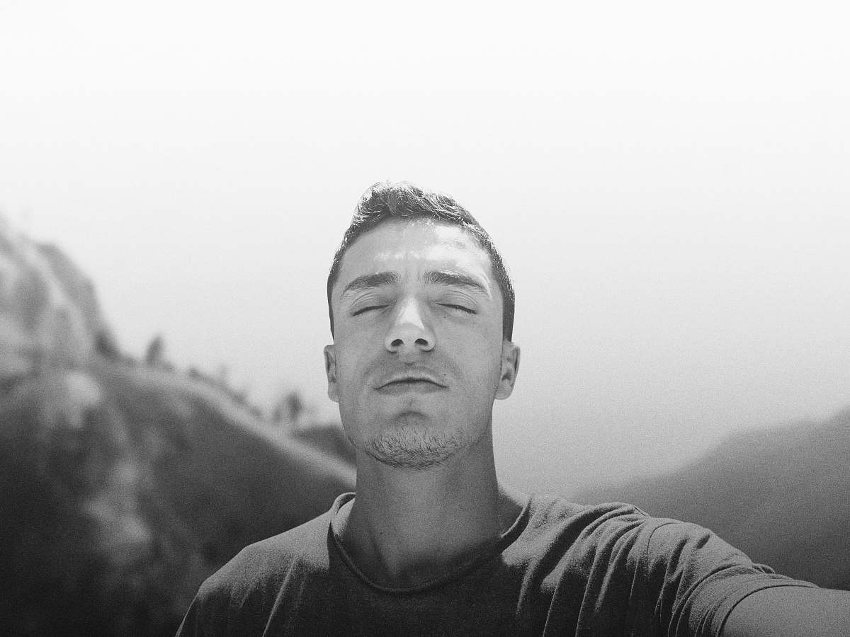 black-and-white grayscale photo of man face
