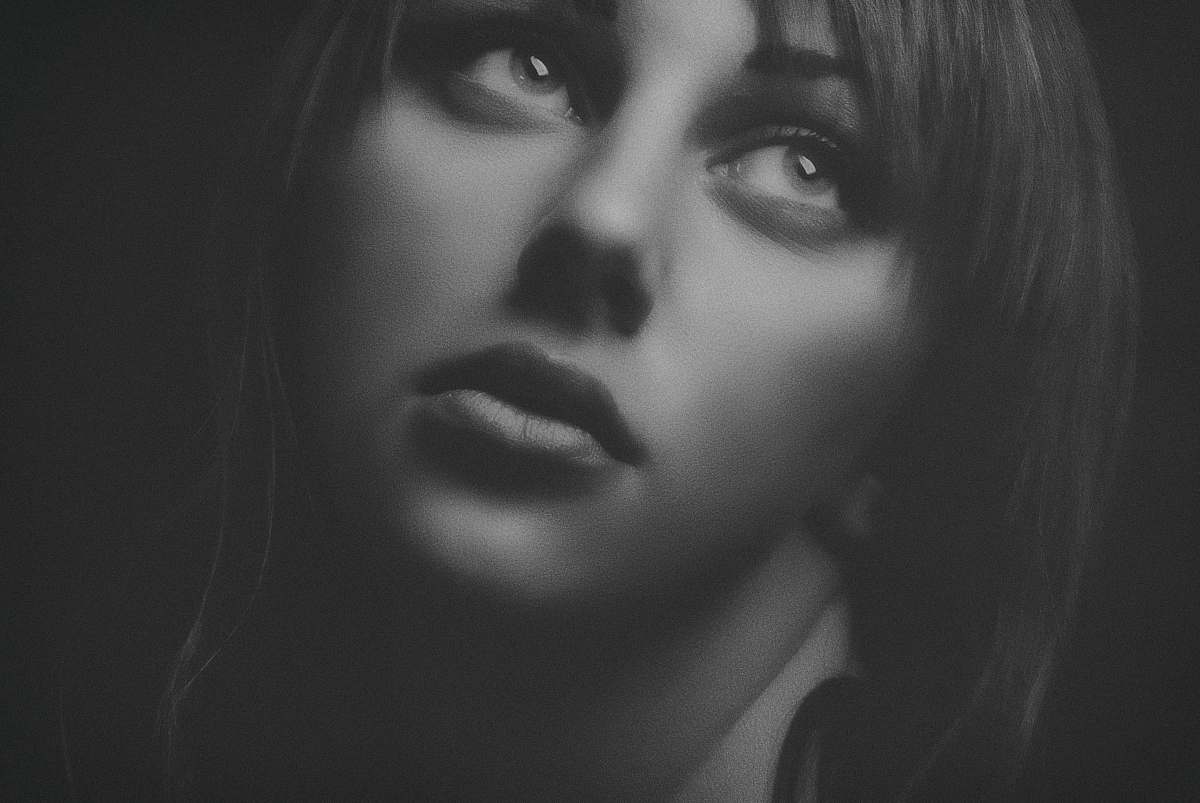 black-and-white grayscale photoggraphy of woman's face face