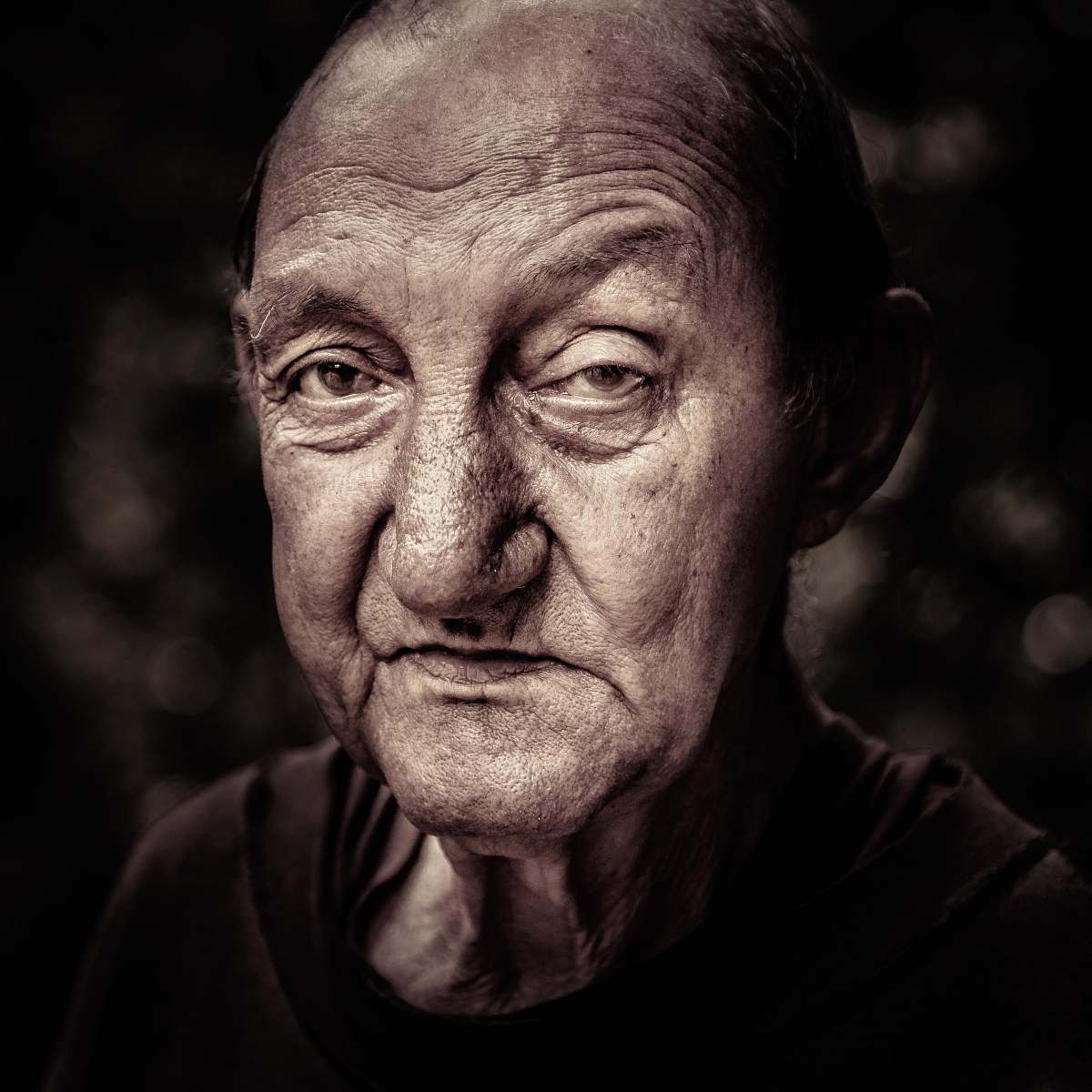 person man wearing black crew-neck top face