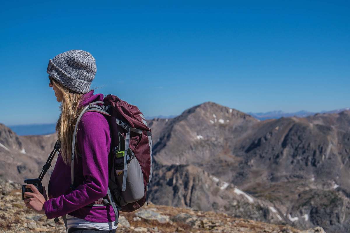 mountain woman hiking on mountain mountain range