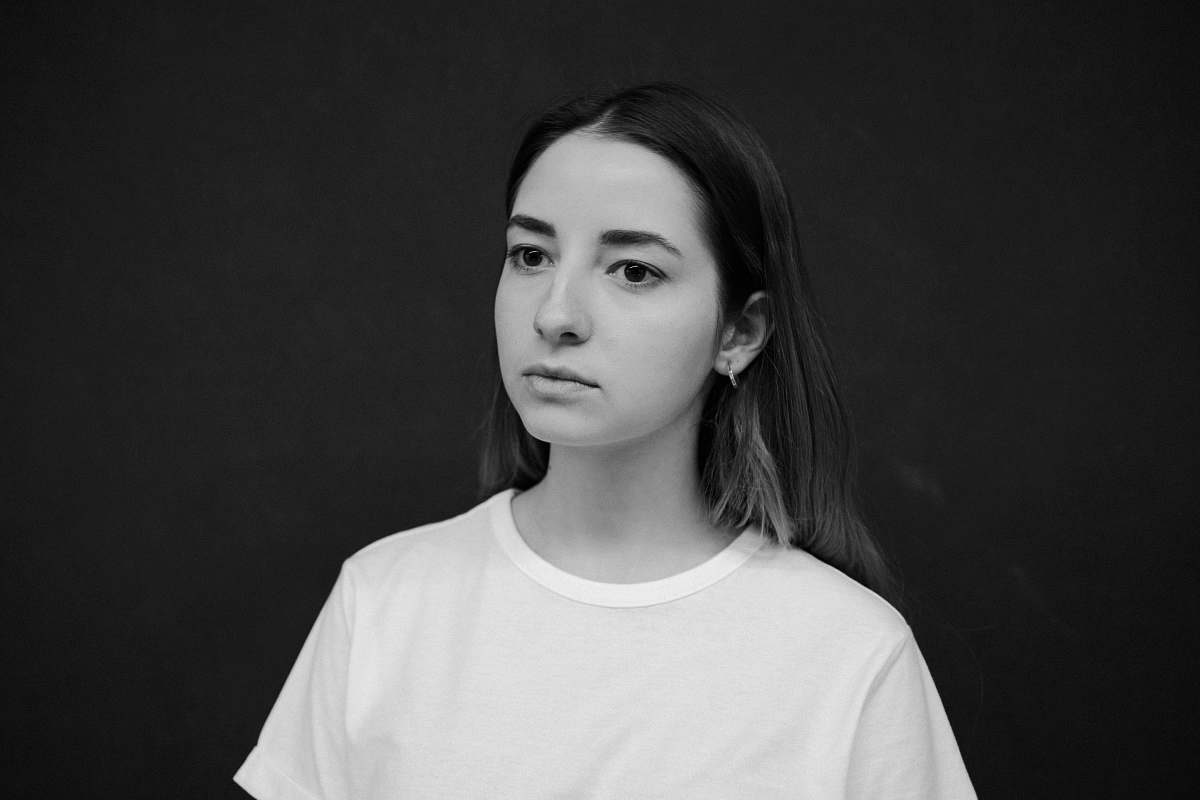 black-and-white woman wearing crew-neck shirt face