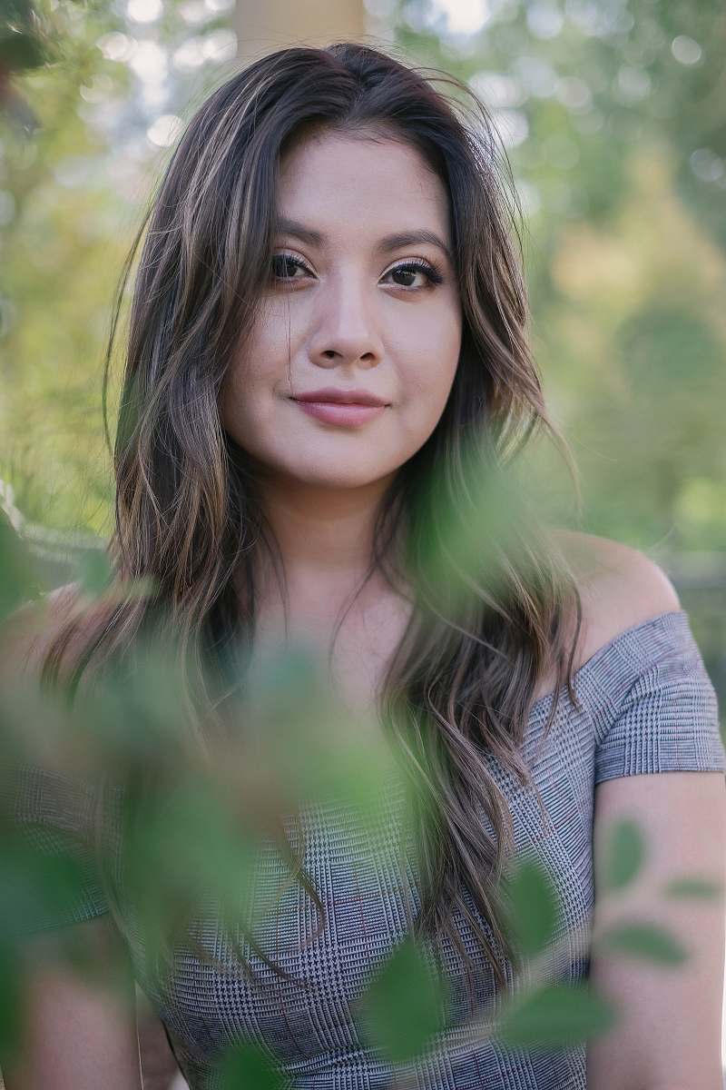 person woman wearing gray off-shoulder shirt face