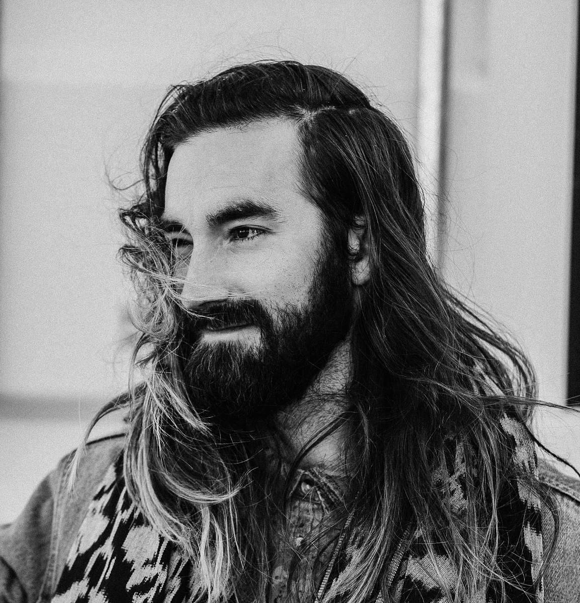 black-and-white man grey-scale photography beard