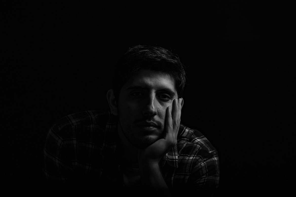 black-and-white greyscale photo of man face