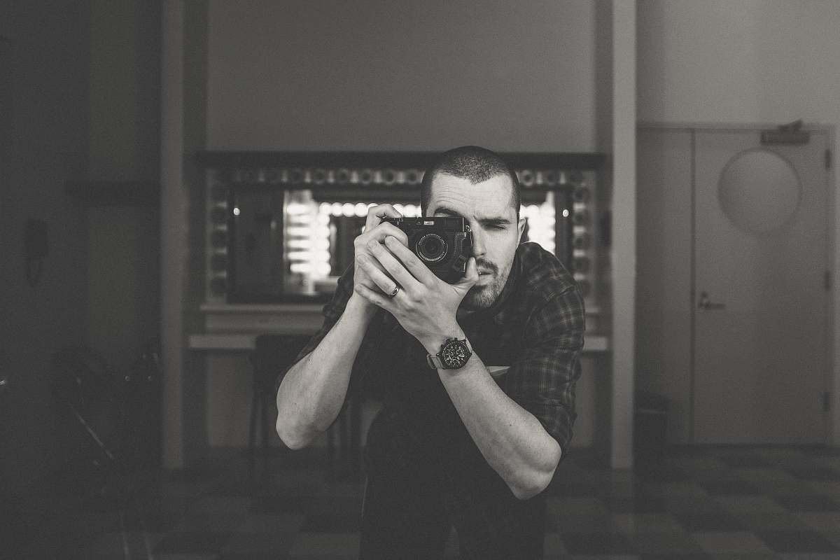 human man taking photo photographer