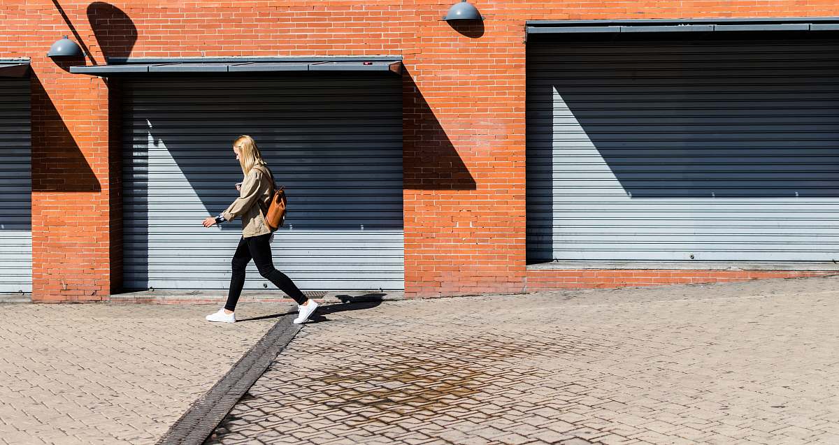 people man walking on running bone pavement walking