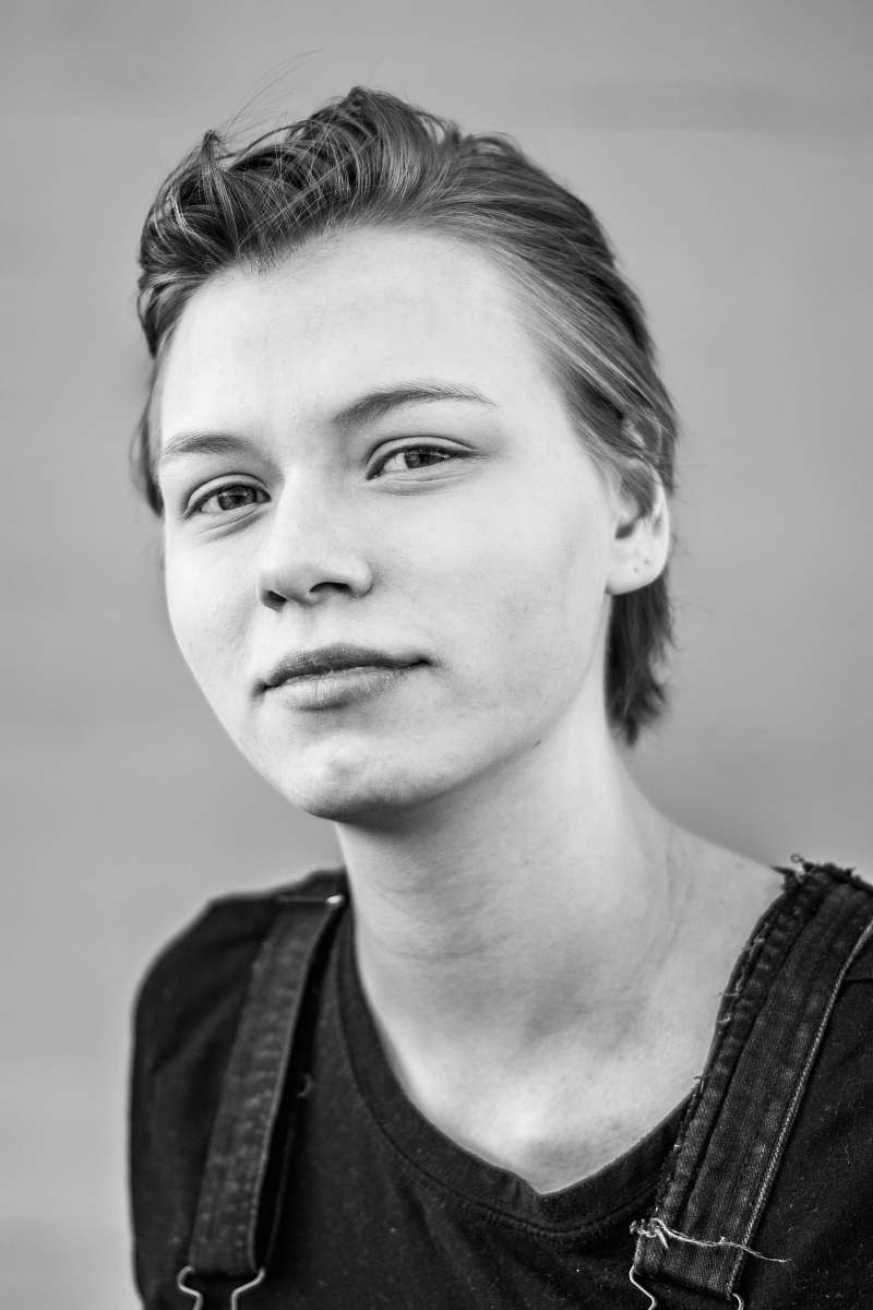 face woman wearing black shirt black-and-white