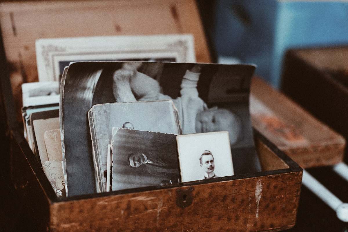 vintage old photos in brown wooden chest pictures