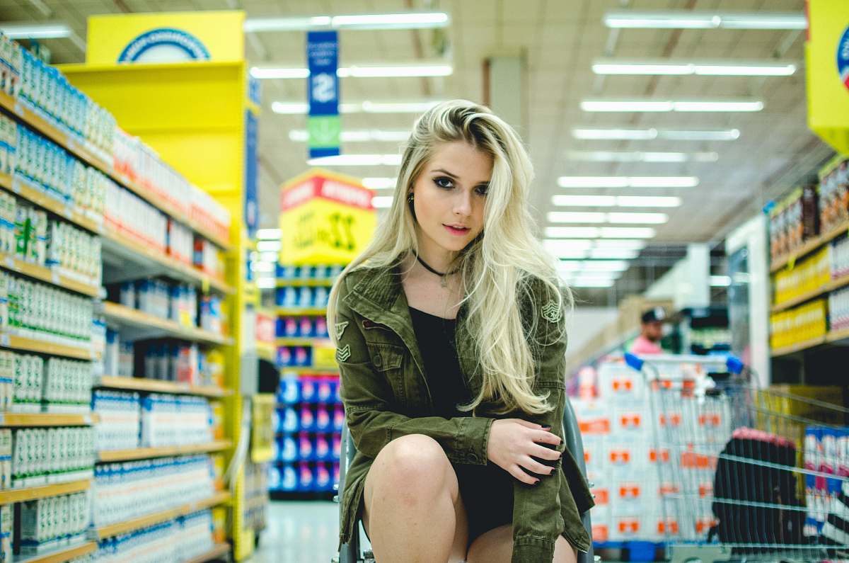 girl woman sitting beside grocery female