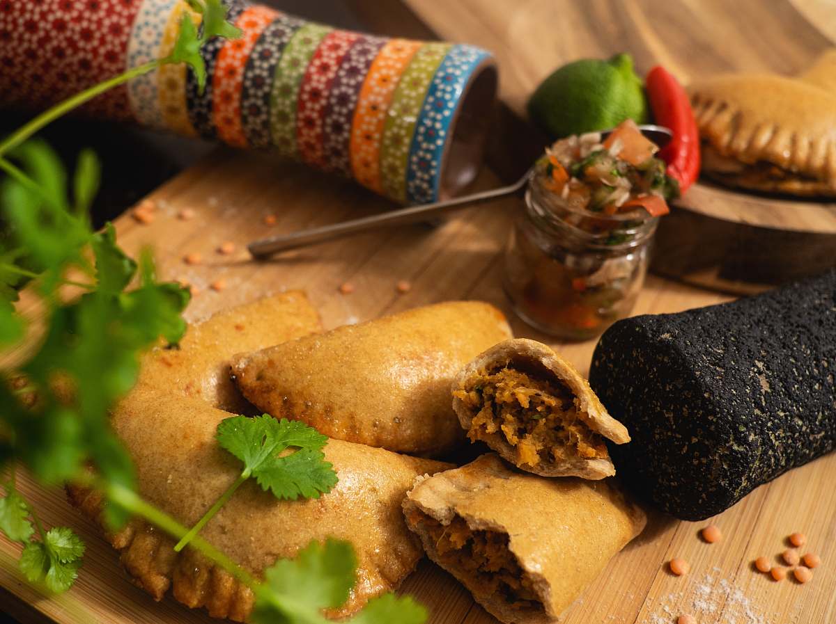 bread pastry breads on brown chopping board plant