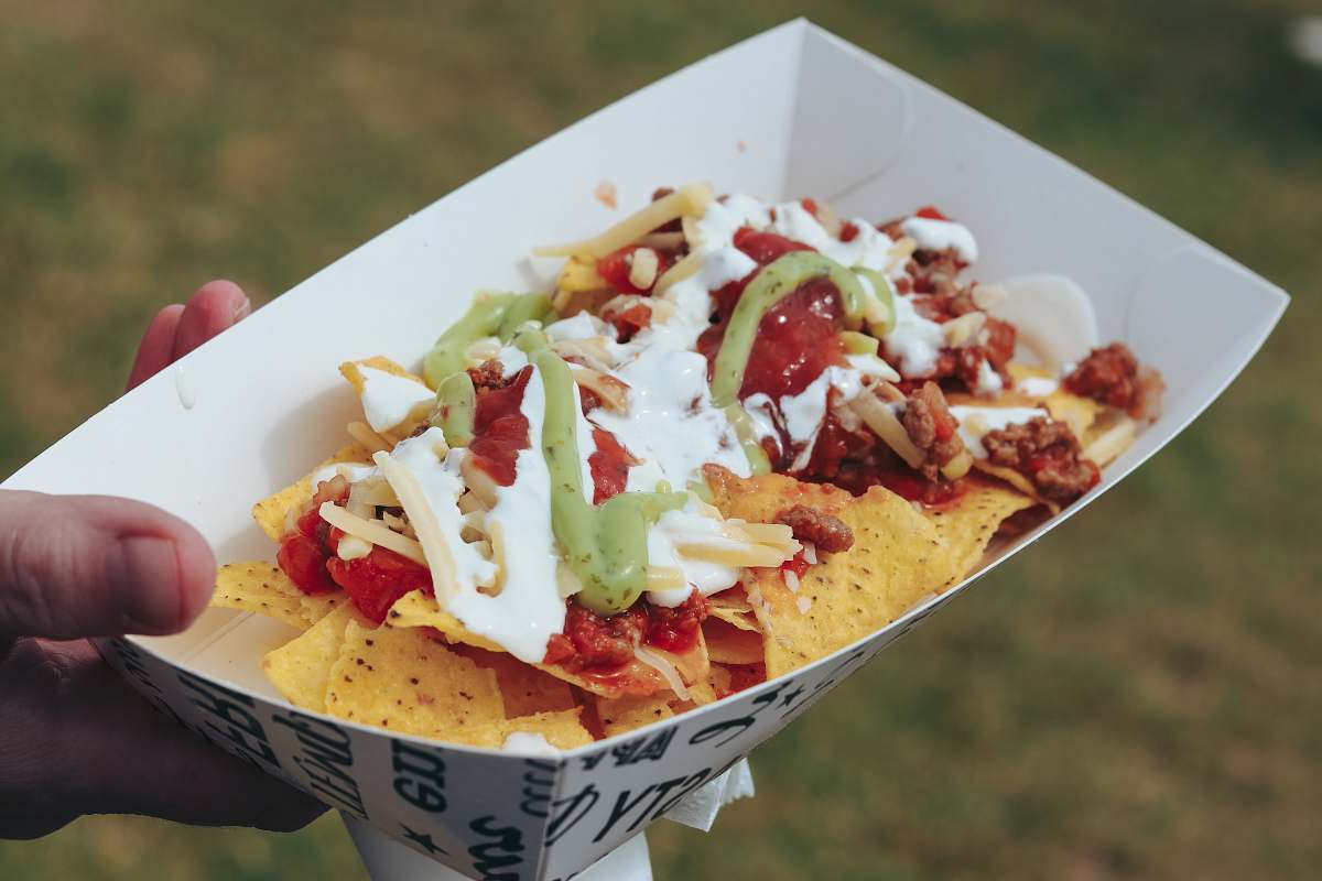food white and red ceramic plate nachos