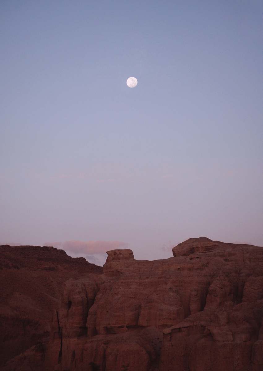 outdoors brown cliff across gray moon mesa