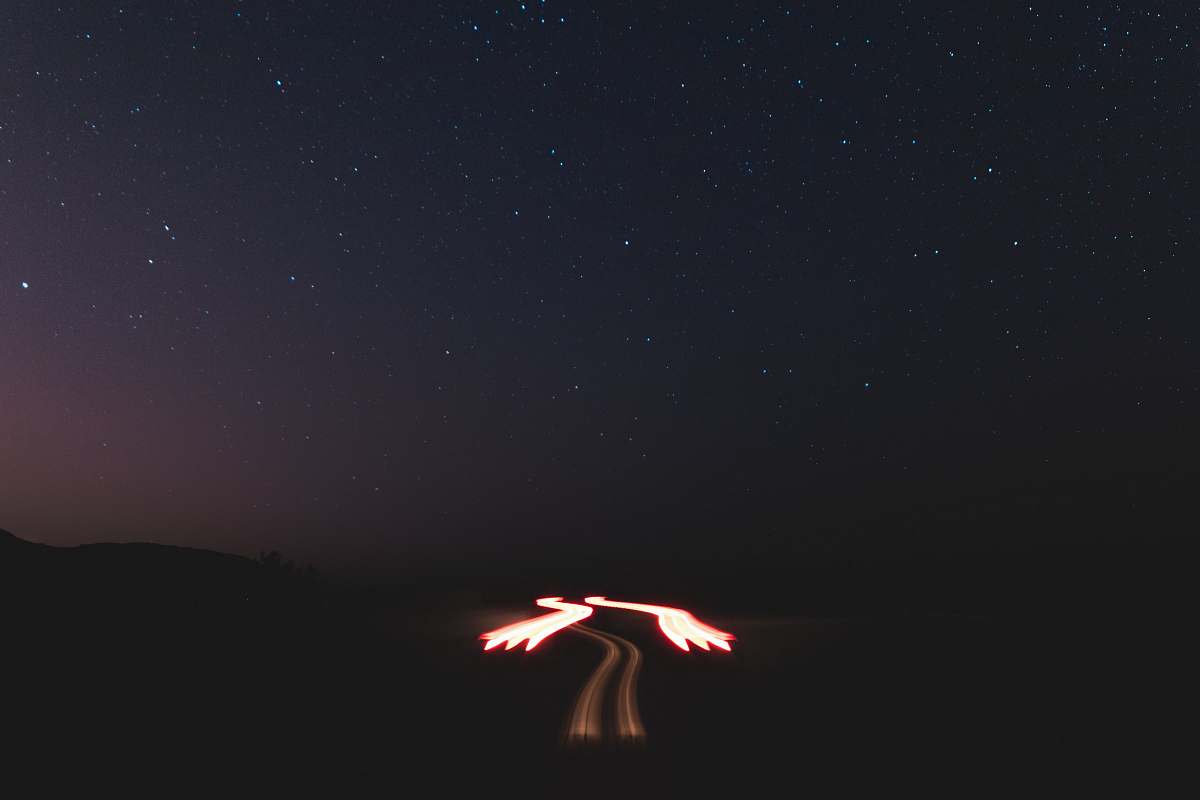 outdoors person doing fire dance during night time night