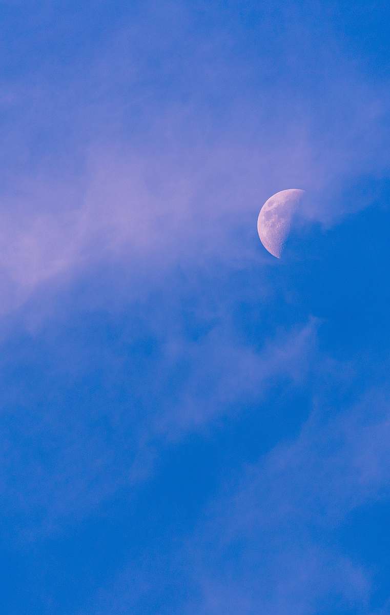 outdoors white clouds and half moon moon