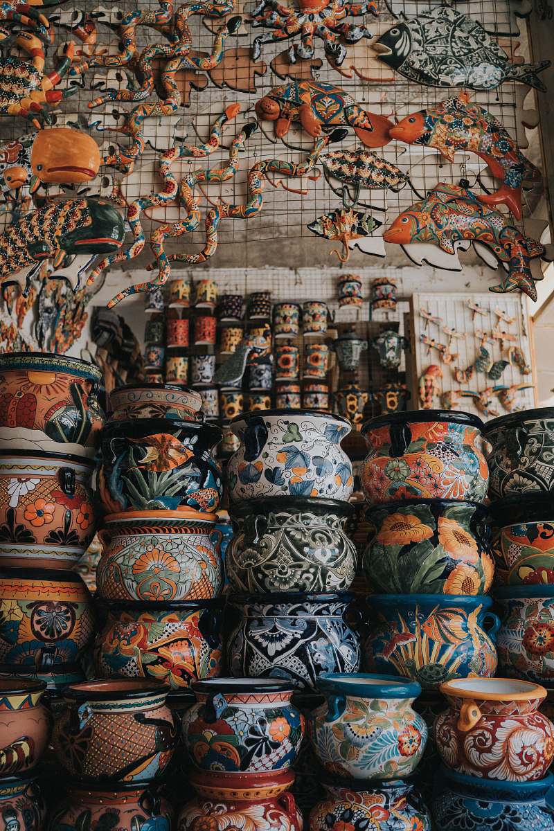 human assorted-color clay pots arranged together people