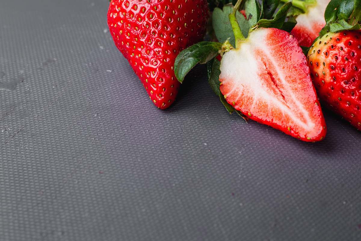 fruit red strawberry on blue textile plant