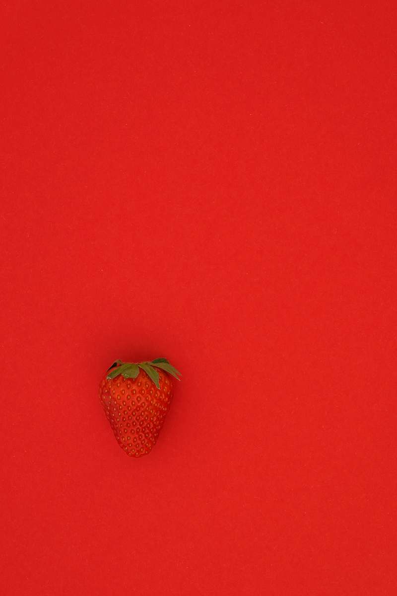 strawberry red strawberry fruit on red surface food