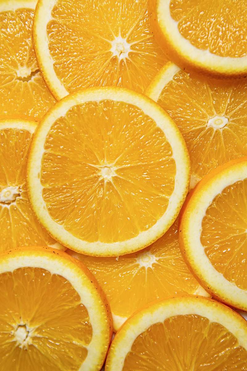 food sliced orange fruit on white ceramic plate citrus fruit