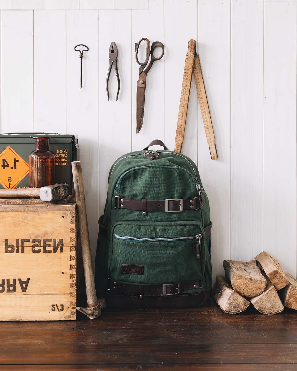 bag green backpack near wall venice
